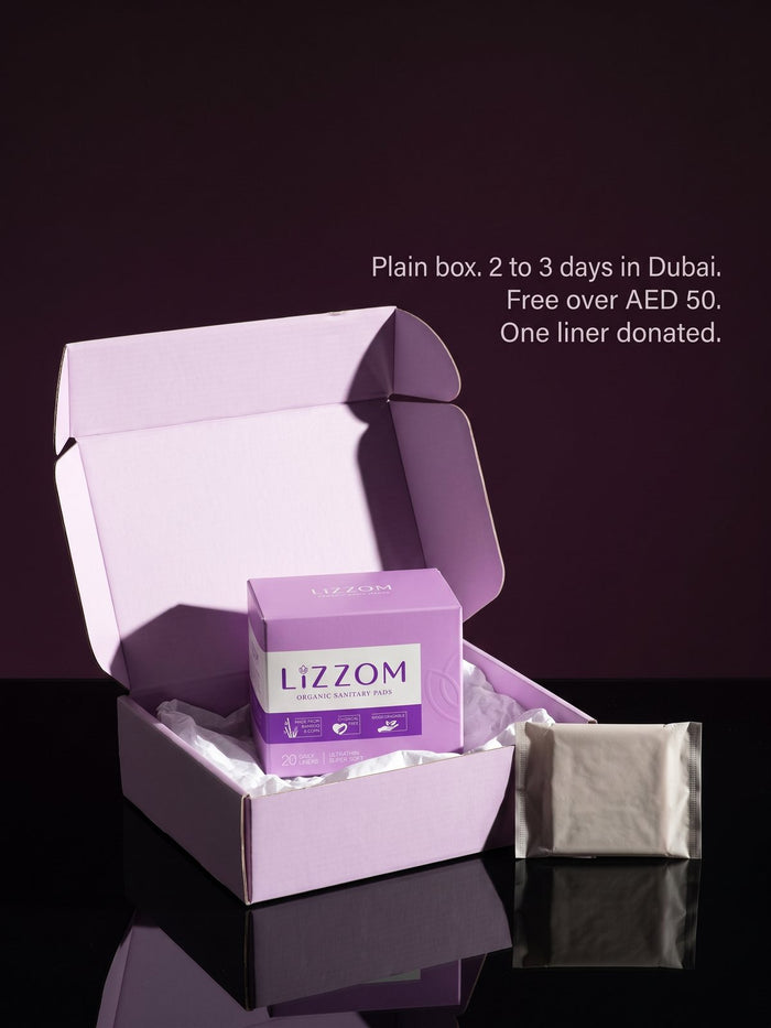 Plain lilac delivery box with a LiZZOM liner box and wrapped liner