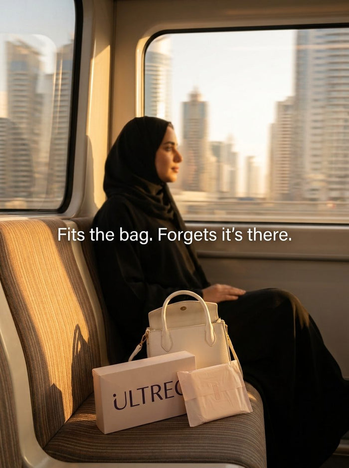 Woman on the Dubai Metro with a LiZZOM box in her bag
